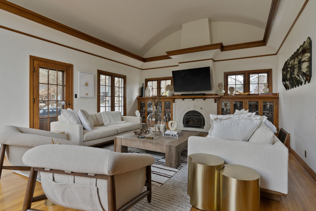 a light, airyy living room space after day with a designer