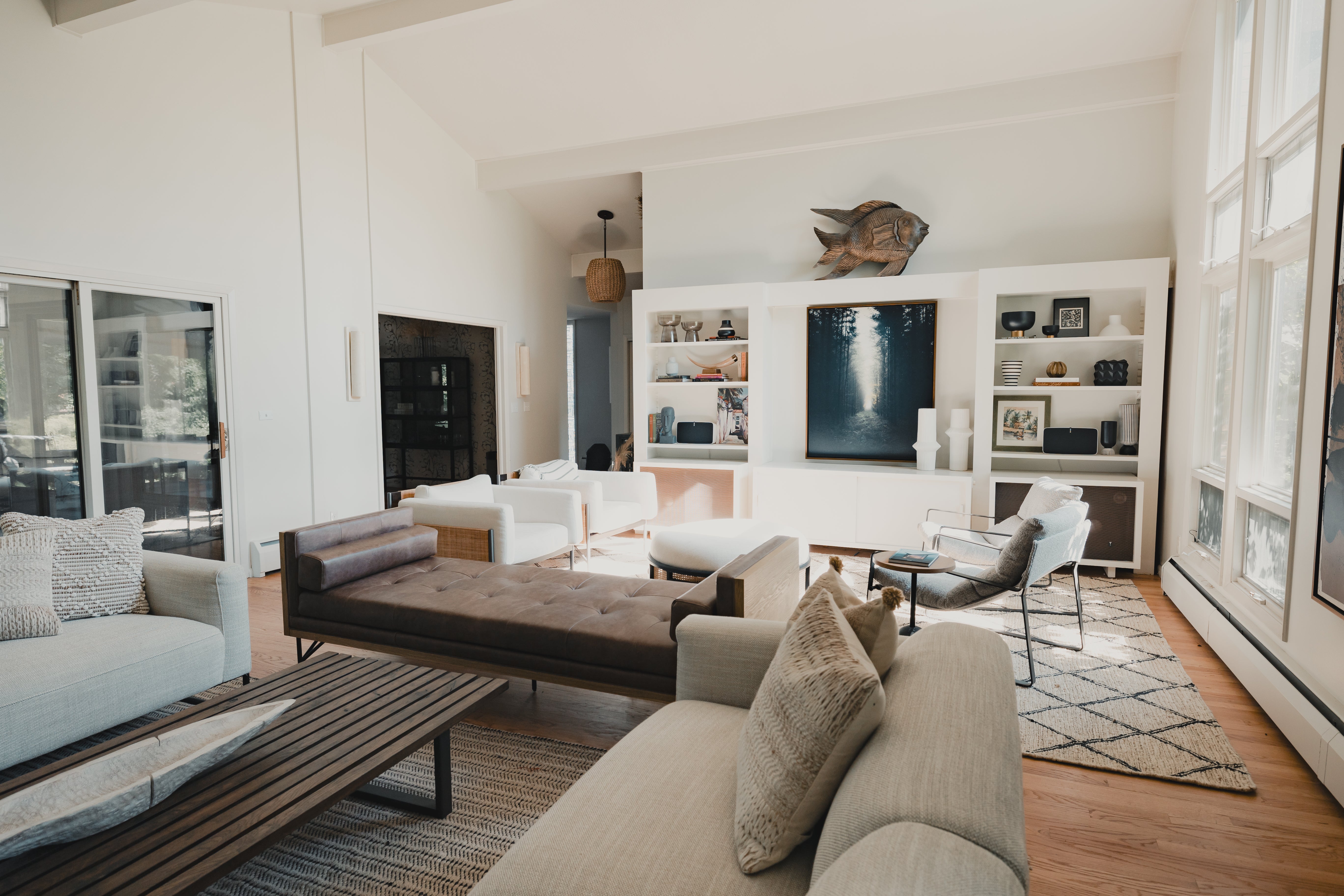 a clean and airy living room space after day with a designer