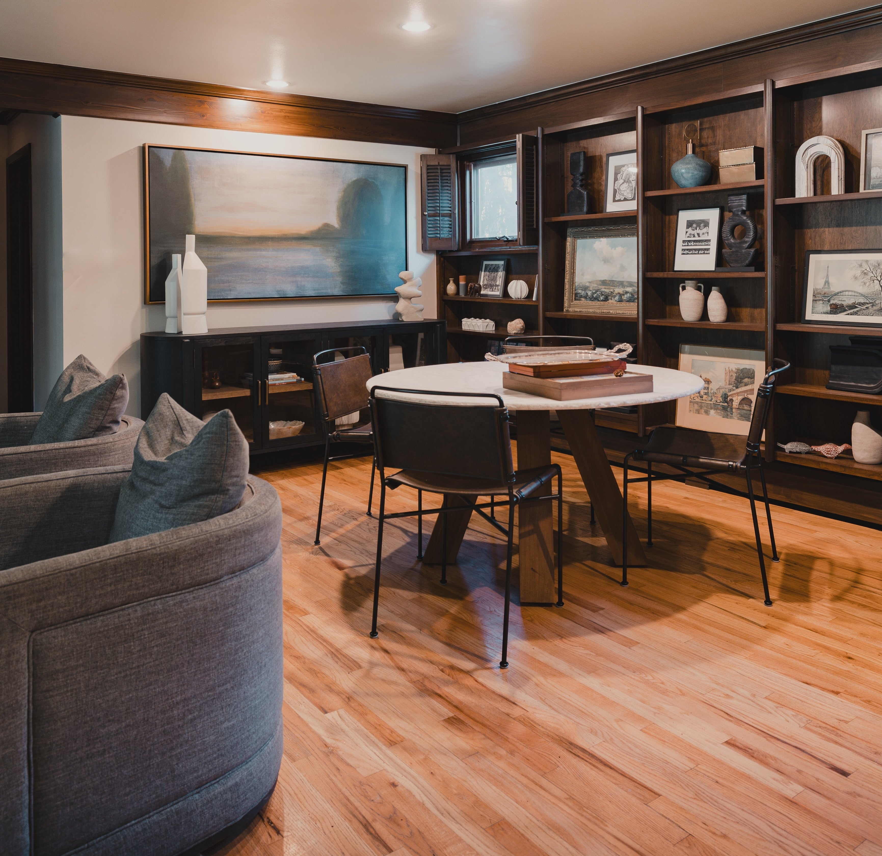 a chic, modern dining room space after day with a designer