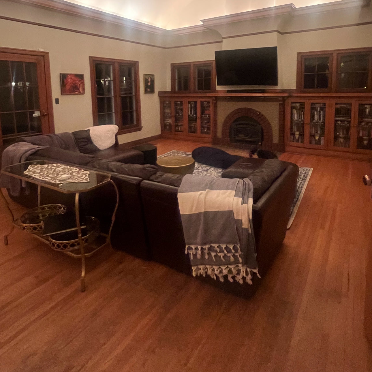 a dark living room space before day with a designer