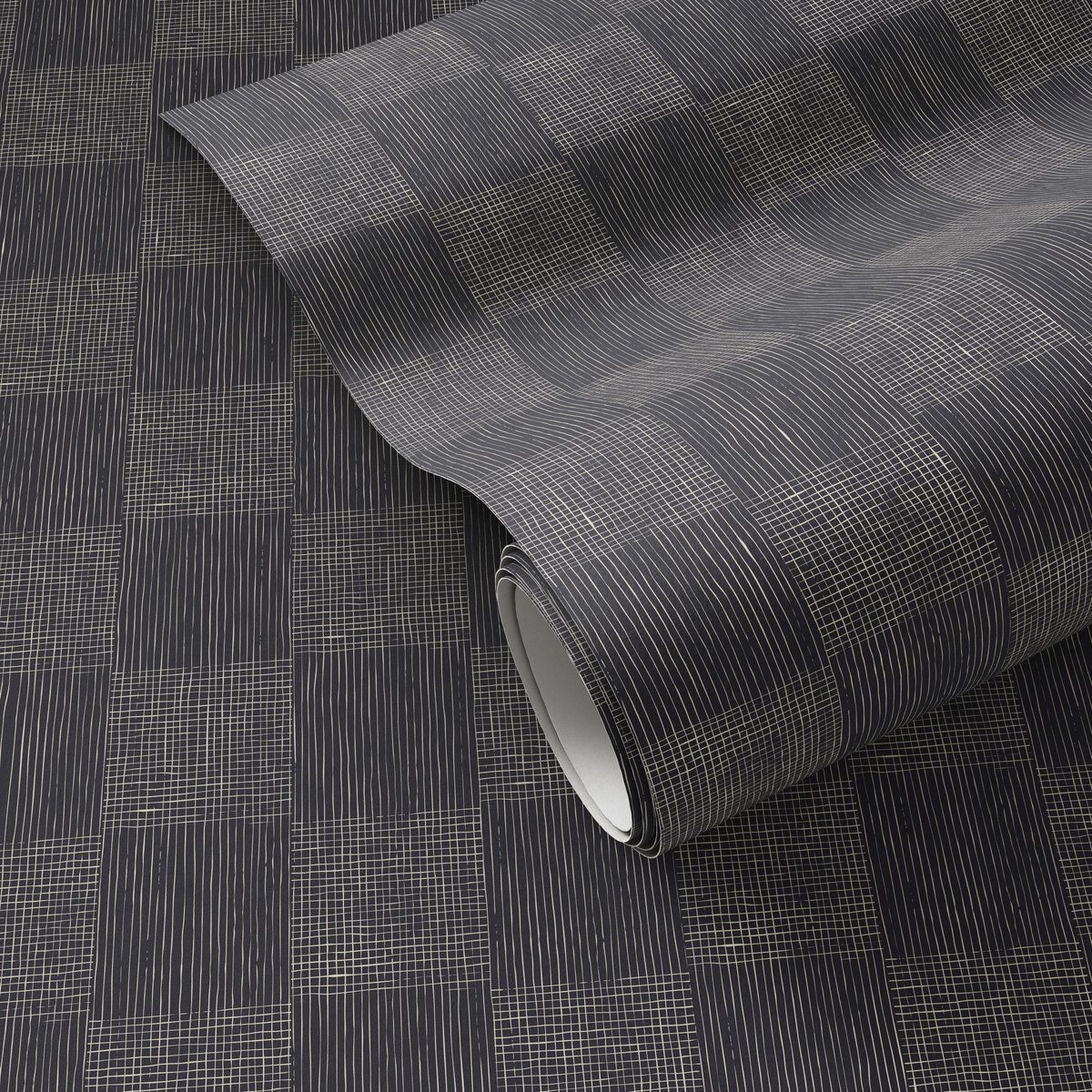 Black checkerboard wallpaper with fine light-colored linework, shown partially rolled.